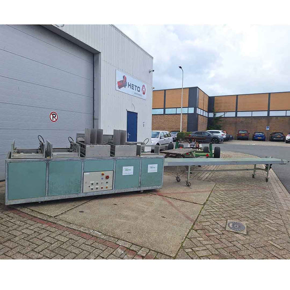 Pot-in-tray machine for placing small pots into trays