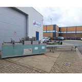 Pot-in-tray machine for placing small pots into trays