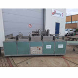 Pot-in-tray machine for placing small pots into trays