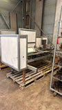 Used Visser buffer conveyor, complete with infeed conveyor and electrical control cabinet.