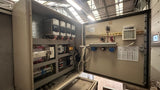 Used Visser buffer conveyor, complete with infeed conveyor and electrical control cabinet.