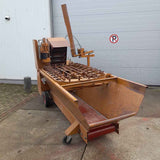 Javo standard potting machine with a single mechanical pot dispenser in very good condition