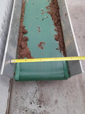Two pieces of long soil conveyor belts/elevator belts.